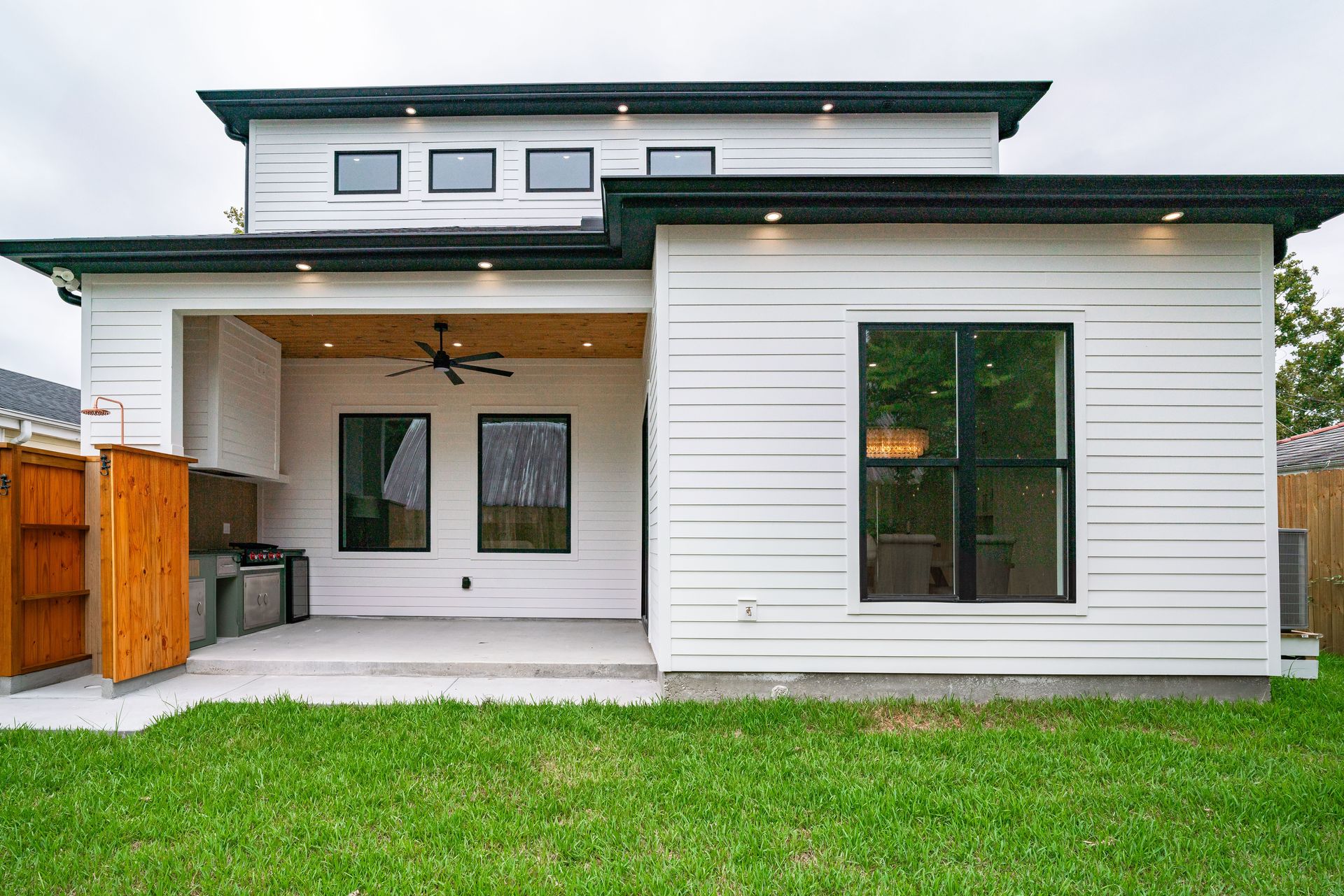 Sleek modern patio view of a New Orleans home showcasing contemporary design.